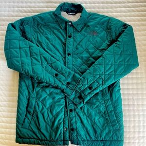Men’s North Face quilted winter jacket with sherpa lining size small EUC.